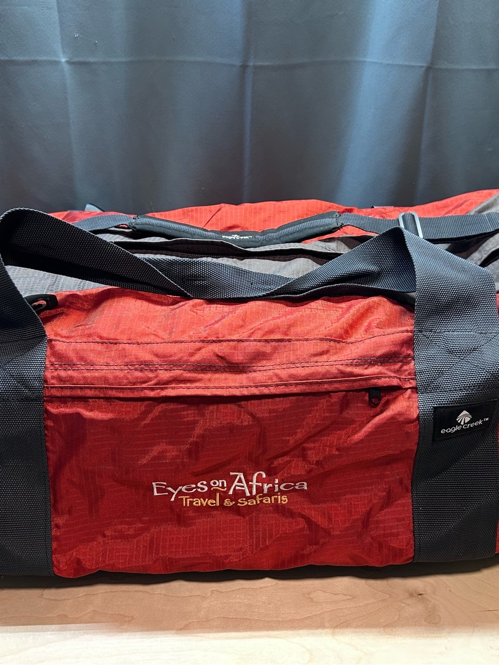 Eyes on Africa Red Travel Duffel Bag with Black Straps